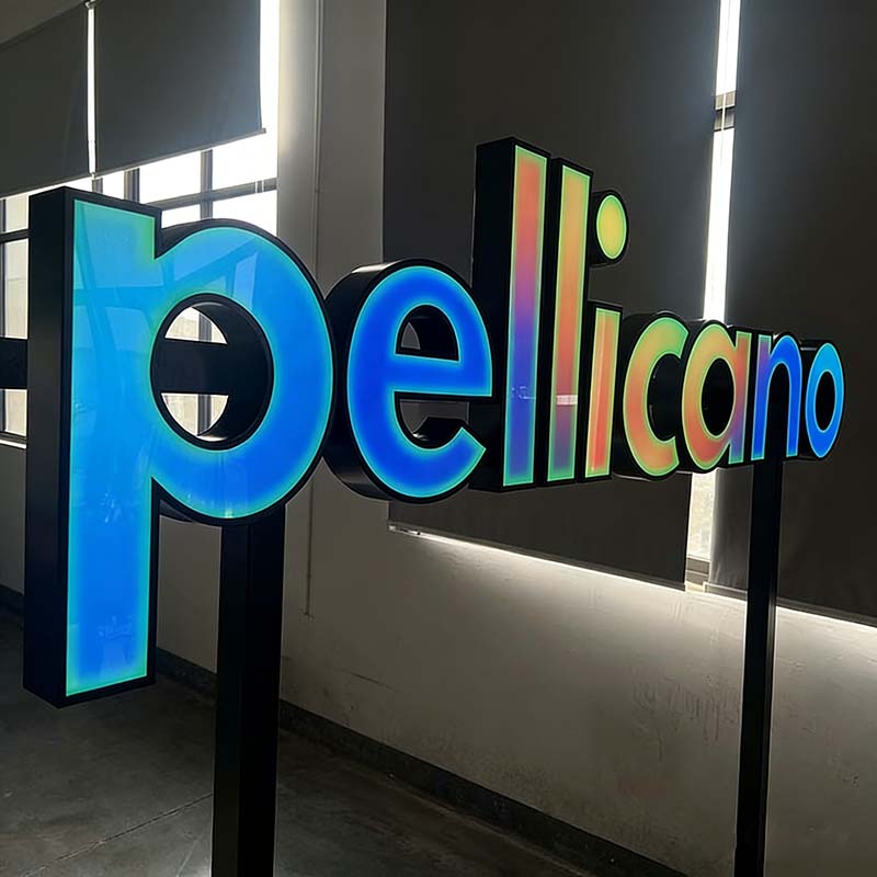 Clean illuminated brand sign for a cosmetics retailer